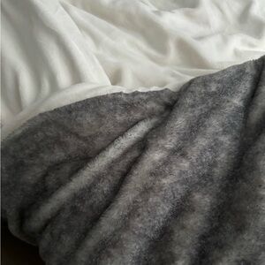 Like new. Full size UGG reversible bedding.  Off white soft velvet/furry grey